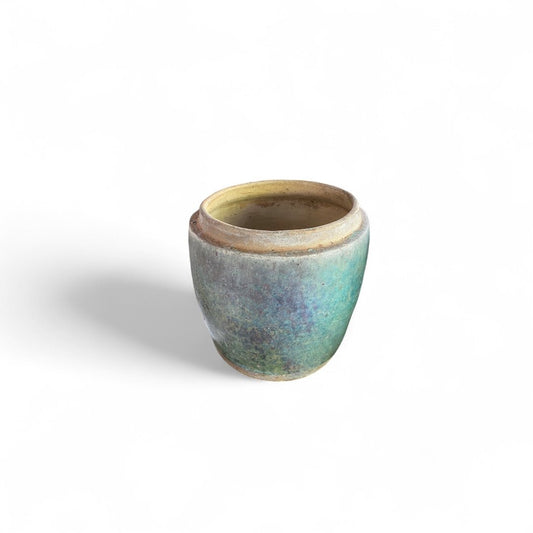 Discover a rare piece of Indonesian cultural history with this Antique Rice Storage Jar from Kalimantan